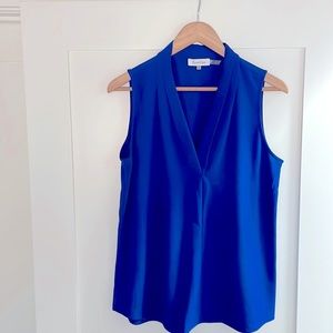 Calvin Klein electric blue sleeveless blouse.